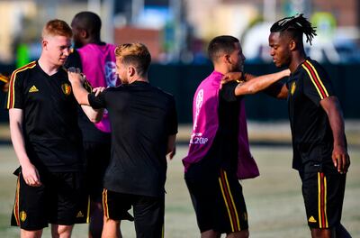 Belgium's Kevin de Bruyne, Thomas Meunier, Eden Hazard and Michy Batshuayi stretch during a training session at the Olympic Park Arena in Sochi. Nelson Almeida / AFP