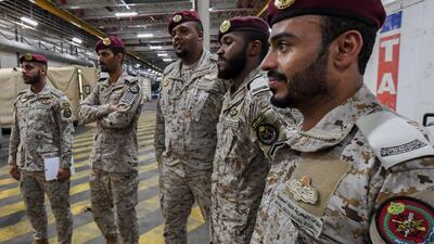 Members of the Saudi special forces stand aboard Britain's RFA Cardigan Bay landing ship on Tuesday. AFP