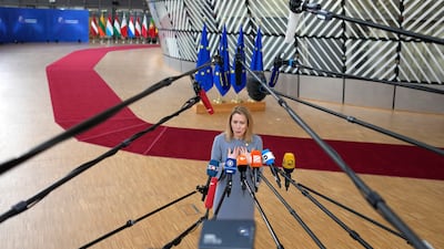 Estonia's Prime Minister Kaja Kallas speaks on arrival at an EU summit in Brussels, where Ukraine and migration are on the agenda. AP
