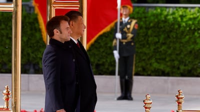The two leaders on the podium at the Great Hall of the People in Beijing. Reuters