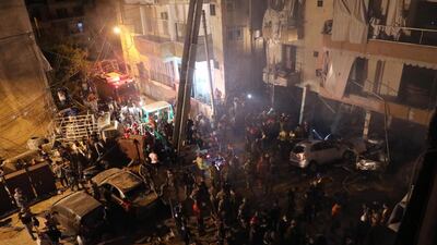 Rescuers work at the site of a fuel tank explosion in the al-Tariq al-Jadida neighborhood of Beirut, Lebanon. REUTERS