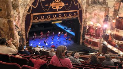 Opera-lovers await the start of a rehearsal of the first socially-distanced performance by English National Opera in the London Coliseum. Getty Images
