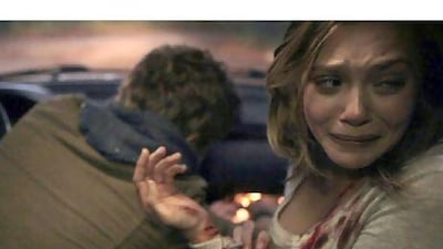 Elizabeth Olsen in Silent House, a remake of the 2010 Uruguayan horror film La Casa Muda by Gustavo Hernández.