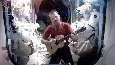Chris Hadfield found fame on social media after he recorded the first music video from space last year. Now he has offered to share knowledge with the UAE over its bid to set up a national space agency. AP Photo