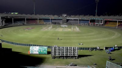 Groundsmen finalise the arrangements for the first match of Pakistan Super League, which begins in Karachi on Saturday. AP