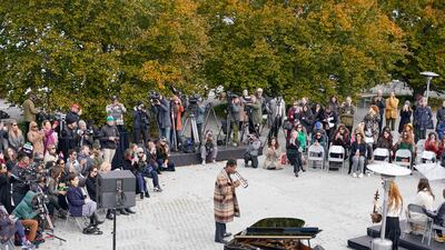 Musician Jon Batiste performs at a press preview of the exhibition. AP