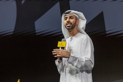 Omar Al Olama, Minister of State for AI, Digital Economy and Remote Work Applications, speaks at Binance Blockchain Week in Dubai on Wednesday. Antonie Robertson / The National