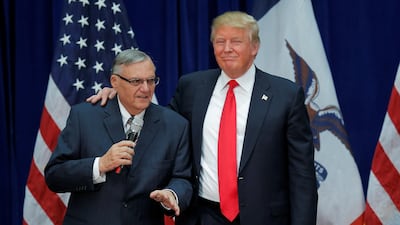 Donald Trump with former Maricopa County Sheriff Joe Arpaio at a rally in Iowa during his 2016 presidential campaign. Brian Snyder/ Reuters