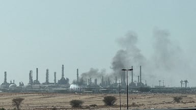 Smoke rises from a fire at the Aramco refinery south of Riyadh. Reuters