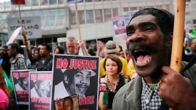 Demonstrators in central London march in protest against the death of Smiley Culture, who died during a police raid on his home. PA Archive