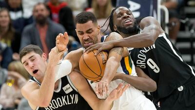 Brooklyn Nets guard Joe Harris and forward DeMarre Carroll and Utah Jazz forward Thabo Sefolosha battle for the ball during the second half at Vivint Smart Home Arena. Russ Isabella / USA TODAY Sports