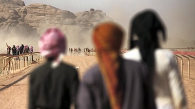 Jordanians race their camels in front of Sheikh Sultan bin Hamdan bin Zayed, President of the Arab Camel Racing Federation and with the presence of Prince Asem bin Nayef, vice president of the Jordan Royal Equestrian Federation, during the annual camel race in Wadi Rum, Jordan. Salah Malkawi / The National