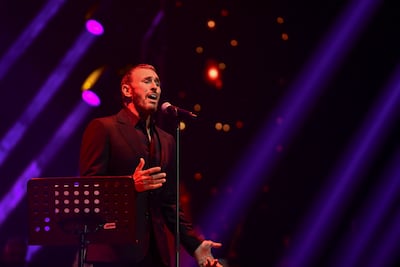 Iraqi singer Kadim Al Sahir performs at the Eid concert held at Etihad Arena, Yas Island. Khushnum Bhandari / The National