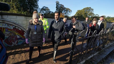 First Minister Humza Yousaf during a visit to River Street in Brechin, Scotland, after flooding caused by Storm Babet. PA