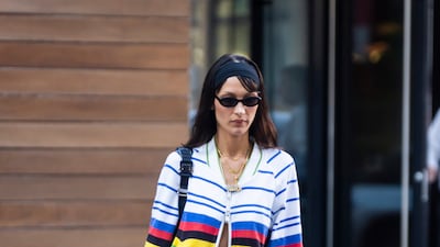 Model Bella Hadid mixes statement and slimline stripes while out running errands in New York. Getty Images