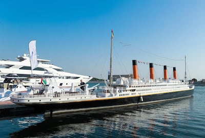 Thw small boat arrived to the tune of the title song from the film Titanic. Victor Besa / The National