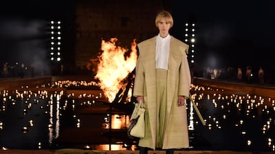 A model walks the runway during the Christian Dior Cruise 2020 show. Getty Images