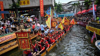 Dragon boat drifting race during festival in Foshan, China. AFP