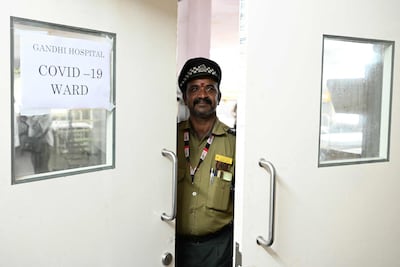 A security guard at the entrance of a Covid isolation ward in Secunderabad, Telangana, southern India. AFP