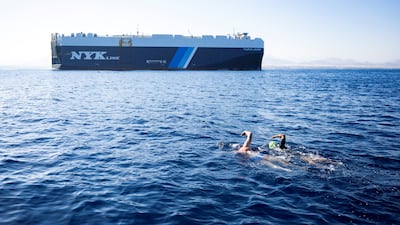 The 9km swim was dangerous due to strong currents and the possibility of sharks.