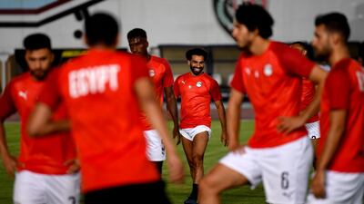 Salah laughs during a training session ahead of their opening match. AFP