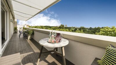 The impressive private terrace spans the length of the property and provides an unparalleled aspect with unobstructed views above the treeline and across the vast open spaces of Hyde Park. Courtesy Berkshire Hathaway HomeServices London