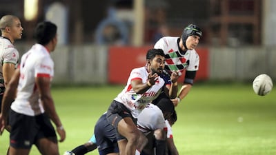 Kandy's Shanushka Abeywickrama gets a pass away. Chris Whiteoak / The National