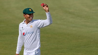 Pakistan's spinner Nauman Ali holds up the ball after taking five wickets against South Africa at the National Stadium in Karachi on Friday. AP