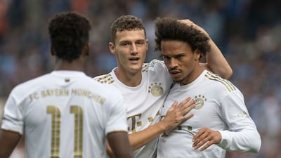 Bayern Munich's Leroy Sane, right, celebrates with Benjamin Pavard after scoring the opening goal. AP