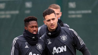 Manchester United's Fred, left, and Diogo Dalot. PA