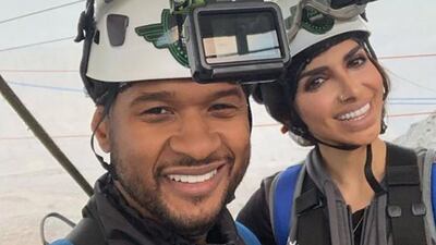 American singer Usher with Emirati entrepreneur Sara Al Madani in Ras Al Khaimah after trying the world's longest zipline. Instagram / Sara Al Madani