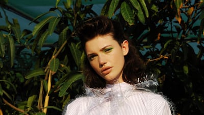 Daisy Fresh: Top, Dh1,278, Madiyah Al Sharqi. Pants; cape, prices on request, both from Chanel