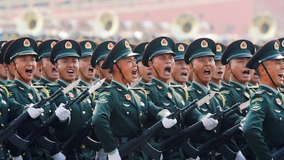 Soldiers of People's Liberation Army march in formation during the military parade marking the 70th founding anniversary of People's Republic of China in Beijing. Reuters