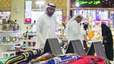 Traditional products, such as prayer mats, are available, as well as homewares, books, fashion and accessories. Leslie Pableo for The National