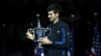 NEW YORK, NY - SEPTEMBER 09: Novak Djokovic of Serbia poses with the championship trophy after winning his men's Singles finals match against Juan Martin del Potro of Argentina on Day Fourteen of the 2018 US Open at the USTA Billie Jean King National Tennis Center on September 9, 2018 in the Flushing neighborhood of the Queens borough of New York City. Matthew Stockman/Getty Images/AFP == FOR NEWSPAPERS, INTERNET, TELCOS & TELEVISION USE ONLY ==