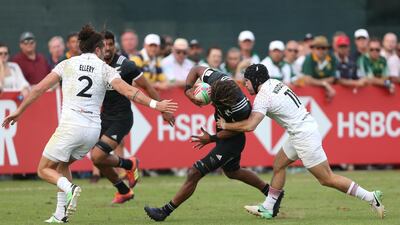 England's Michael John Ellery and Ethan Waddleton in action with Masirewa. Reuters