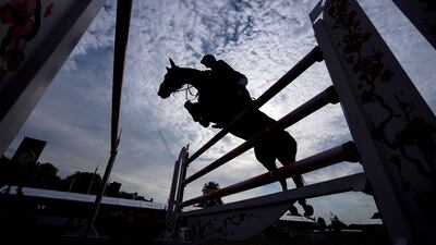 Guy Williams competes in the Pearl Stakes, riding Rouge de Ravel, at the Royal Windsor Horse Show, Windsor Great Park, England on July 2, 2021.