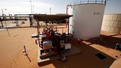 Storage tanks at Libya's El Sharara oil field. The country's oil production was about 1.3 million barrels a day before the closure of oil ports in the east. Reuters