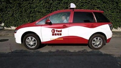 A BYD E6 electric car, used as a taxi in Shenzhen, is seen on a road in the southern Chinese city of Shenzhen May 24,2010. The BYD E6 electric cars are China's first indigenous electric taxis, and Beijing hopes their use will reduce air pollution in cities, reported the South China Morning Post. REUTERS/Tyrone Siu (CHINA - Tags: BUSINESS TRANSPORT ENVIRONMENT SOCIETY) *** Local Caption *** SHZ01_SHENZHEN_0524_11.JPG