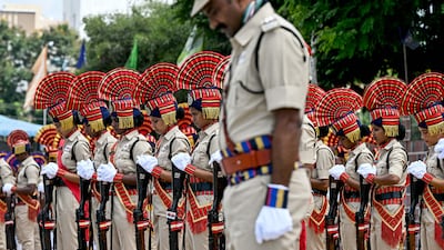 Officers pay tribute to fallen colleagues at a Police Commemoration Day event in Hyderabad, India. AFP