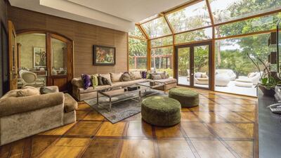 The lounge doubles as a solarium. Courtesy LuxuryProperty.com