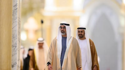 Sheikh Khaled and Sheikh Theyab bin Mohamed, chairman of the Office of Development and Martyrs Families Affairs, attend the reception. Abdulla Al Neyadi / UAE Presidential Court