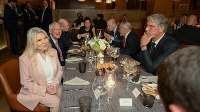 Sara Netanyahu, the wife of Israeli Prime Minister Benjamin Netanyahu, sits across from Lebanese banker Antoun Sehnaoui at a memorial dinner for US senator Lindsey Graham in Washington on Monday. Handout via Reuters