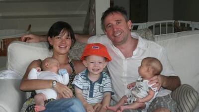 Chantelle and Peter Campbell with their children, Archie, 3, and twins George and Abi. The family lived in Abu Dhabi but returned to Mr Campbell's native Scotland after his wife became terminally ill. Courtesy Campbell family