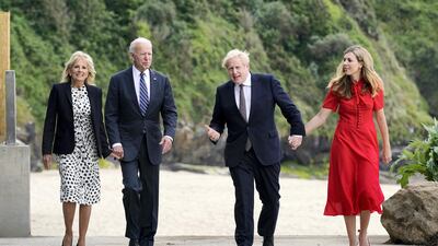 US President Joe Biden and first lady Jill Biden are greeted and walk with British Prime Minister Boris Johnson and his wife Carrie Johnson in Carbis Bay. AP Photo