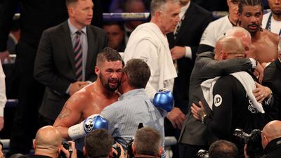 Tony Bellew celebrates after defeating David Haye in the fifth round. Sean Dempsey / EPA