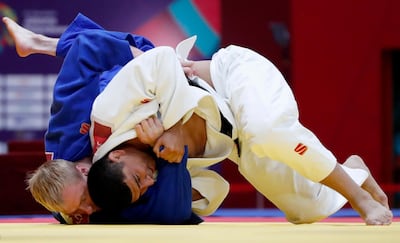 Moldovan-born Ivan Remarenco, in blue, had already qualified for the Tokyo Olympics. Reuters