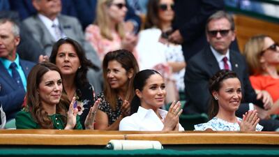 Britain's Catherine, Duchess of Cambridge, with Meghan, Duchess of Sussex, and Pippa Middleton in the Royal Box ahead of the final between Serena Williams of the U.S. and Romania's Simona Halep REUTERS/Hannah McKay