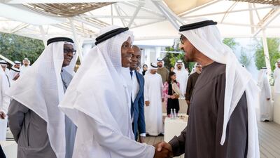 Sheikh Mohamed greets David Sengeh, Chief Minister of Sierra Leone. Abdulla Al Bedwawi / UAE Presidential Court