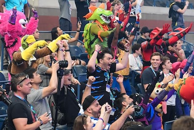 The families of Aqua and Nyhrox celebrate after winning the duos finals at the Fortnite World Cup Finals e-sports event at Arthur Ashe Stadium. Dennis Schneidler / USA Today Sports